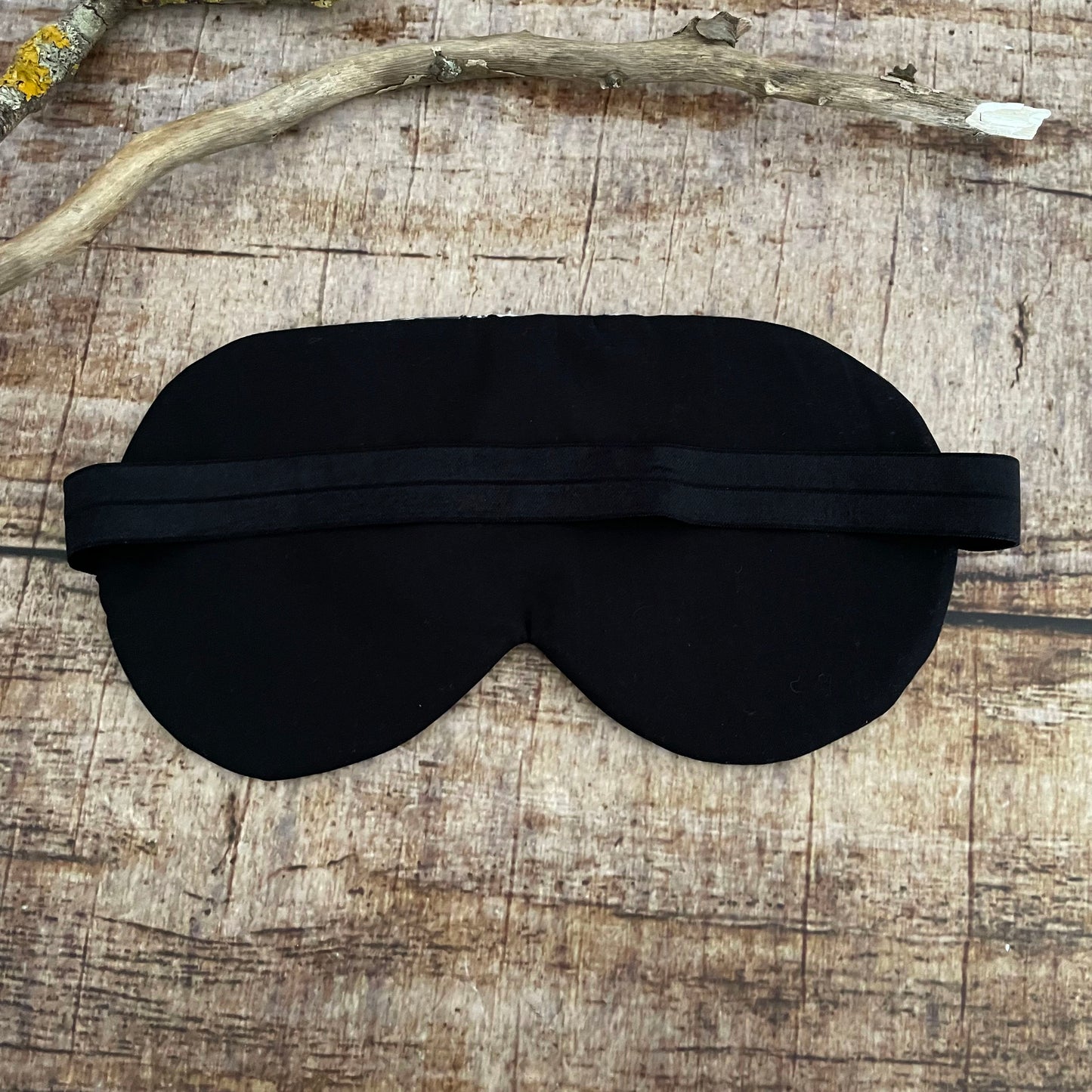 Schlafmaske Wunderland schwarz gold Reisemaske